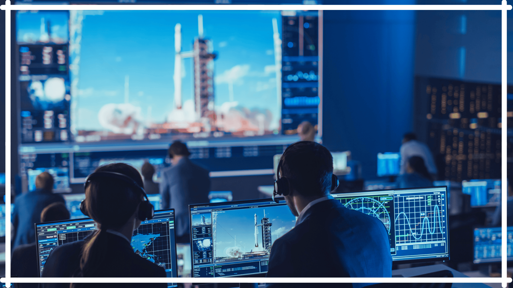 Team of experts at mission control monitoring the launch of a rocket | Unstuck | Stryber